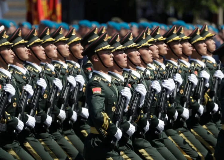 Soldiers from China's People's Liberation Army march on Red Square during a military parade, which marks the 75th anniversary of the Soviet victory over Nazi Germany in World War Two, in Moscow on June 24, 2020. - The parade, usually held on May 9, was postponed this year because of the coronavirus pandemic. (Photo by Pavel Golovkin / POOL / AFP) (Photo by PAVEL GOLOVKIN/POOL/AFP via Getty Images)