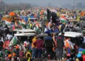TOPSHOT - Farmers take part in a tractor rally as they continue to demonstrate against the central government's recent agricultural reforms in New Delhi on January 26, 2021. (Photo by Money SHARMA / AFP)