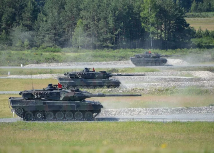German soldiers assigned to the German Army’s 3rd Panzer Battalion operate Leopard 2A6 tanks on the Offensive Operations lane during the Strong Europe Tank Challenge, June 4, 2018. U.S. Army Europe and the German Army co-host the third Strong Europe Tank Challenge at the Grafenwoehr Training Area, June 3 – 8, 2018. The Strong Europe Tank Challenge is an annual training event designed to give participating nations a dynamic, productive and fun environment in which to foster military partnerships, form Soldier-level relationships, and share tactics, techniques and procedures. (U.S. Army photo by Spc. Rolyn Kropf)