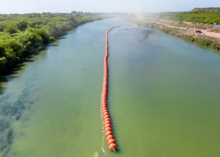 EAGLE PASS, TEXAS - JULY 18: Buoy barriers are installed and situated in the middle of the Rio Grande river on July 18, 2023 in Eagle Pass, Texas. Texas has begun installing buoy barriers along portions of the Rio Grande river in an effort to deter illegal border crossings. (Photo by Brandon Bell/Getty Images)