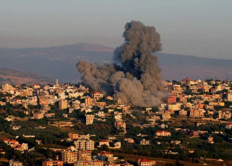 Black smoke billows following an Israeli air strike that targeted a house in the southern Lebanese village of Khiam near the Lebanese-Israeli border on June 21, 2024, amid ongoing cross-border clashes between Israeli troops and Hezbollah fighters. - UN Secretary-General Antonio Guterres warned on June 21, that fighting between Israel and Hezbollah must not turn Lebanon into "another Gaza." (Photo by Rabih DAHER / AFP)