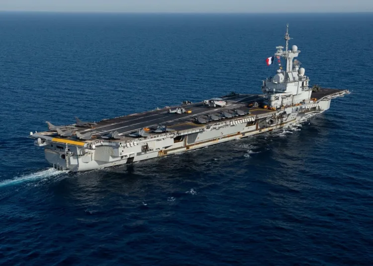 The French Marine Nationale aircraft carrier FS Charles de Gaulle (F 91) transits the Red Sea, April 15, 2019. The John C. Stennis Carrier Strike Group is deployed to the U.S. 5th Fleet area of operations in support of naval operations to ensure maritime stability and security in the Central Region, connecting the Mediterranean and the Pacific through the western Indian Ocean and three strategic choke points. (U.S. Navy photo by Mass Communication Specialist 3rd Class Skyler Okerman)