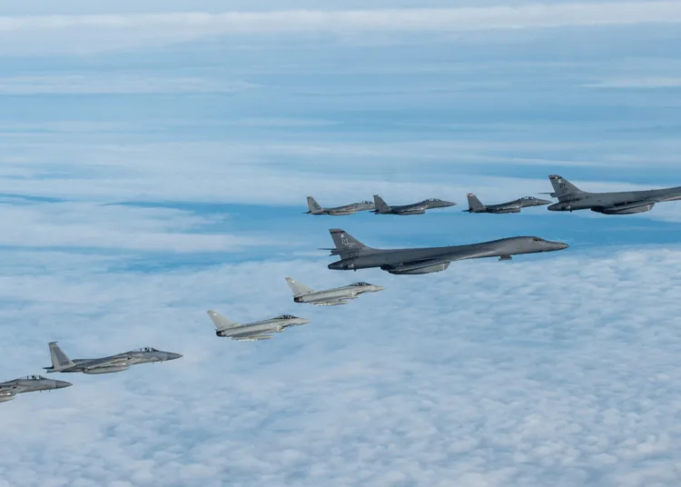 US Air Force F-15C Eagles and F-15E Strike Eagles, and Royal Air Force Typhoon FGR4 aircraft, during a bomber task force mission.