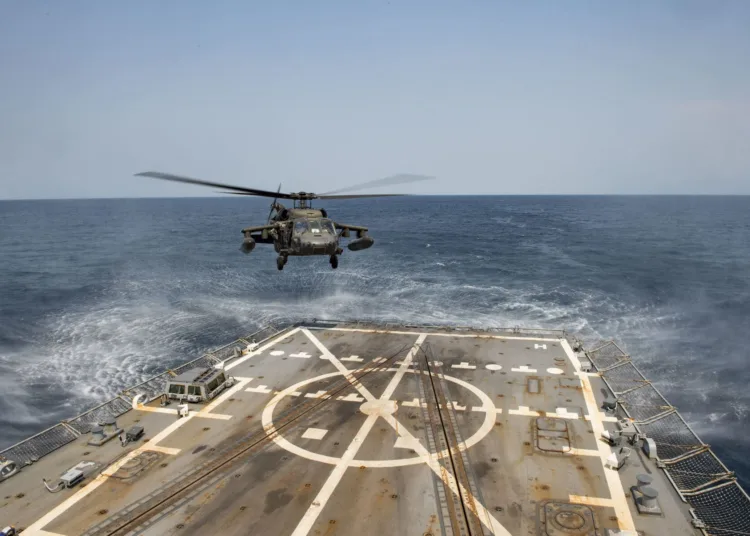 160414-N-MD297-041 PACIFIC OCEAN (April 14, 2016) An Army UH-60 Blackhawk helicopter from the 1st Battalion, 228th Aviation Regiment lands on the flight deck aboard the Arleigh Burke-class guided-missile destroyer USS Lassen (DDG 82) while conducting deck landing qualifications (DLQs). Lassen is currently underway in support of Operation Martillo, a joint operation with the U.S. Coast Guard and partner nations within the 4th Fleet area of responsibility. Operation Martillo is being led by Joint Interagency Task Force South, in support of U.S. Southern Command. (U.S. Navy photo by Mass Communication Specialist 2nd Class Huey D. Younger Jr./Released)