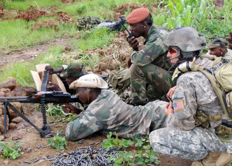 A French-speaking Special Forces NCO watches weapons marksmanship training for a member of a Malian counter-terrorism unit during one of over 30 pre-scheduled military training engagements planned, coordinated and managed by SOCAFRICAs JSOTF-TS. Keen in the myriad of different weapons used around the world, Special Forces teams provide capacity development training and advisement to pre-designated host nation units whose mission is to provide for the security of the vast and barren northern territories. Planned, coordinated and managed under the auspices of the State Departments Trans-Saharan Counter Terrorism Partnership, Department of Defense TSCTP activities in the region are planned, coordinated and conducted under the auspices of Operation Enduring Freedom (Trans-Sahara) and are managed by SOCAFRICAs Joint Special Operations Task Force (Trans-Sahara). (Photos are provided by JSOTF-TS Public Affairs)
