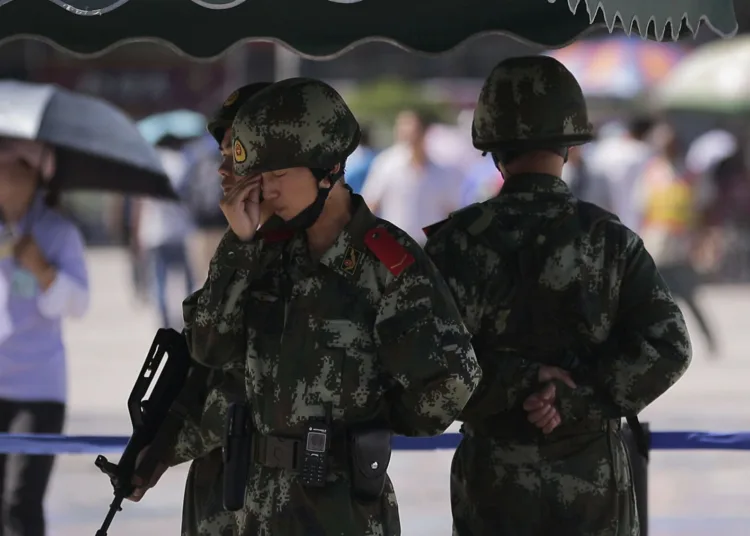 © AP Photo / Andy Wong