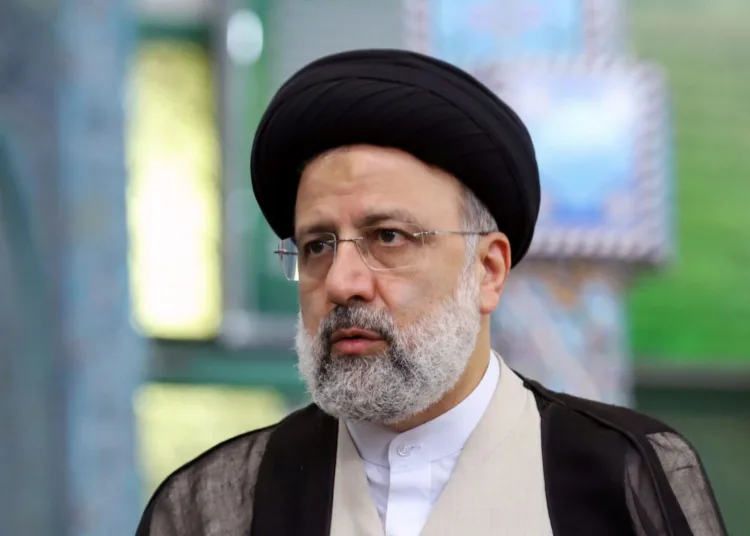 Presidential candidate Ebrahim Raisi looks on at a polling station during presidential elections in Tehran, Iran June 18, 2021. Majid Asgaripour/WANA (West Asia News Agency) via REUTERS ATTENTION EDITORS - THIS IMAGE HAS BEEN SUPPLIED BY A THIRD PARTY.
