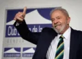 (FILES) In this file photo taken on March 06, 2020 Former Brazilian president Luiz Inacio Lula da Silva gives a thumb up during an event titled: "Dialogue about inequality with global unions and general public" at the Geneva Press Club in Geneva. - A Brazilian Supreme Court judge overturned the graft convictions against former president Luiz Inacio Lula da Silva on March 8, 2021, clearing the way for the left-wing leader to run in the 2022 presidential election. (Photo by Fabrice COFFRINI / AFP)