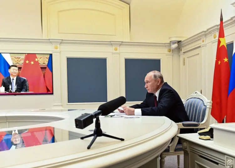 Russian President Vladimir Putin holds a meeting via video conference with Chinese President Xi Jinping at the Kremlin in Moscow on June 28, 2021. (Photo by Alexey NIKOLSKY / Sputnik / AFP) (Photo by ALEXEY NIKOLSKY/Sputnik/AFP via Getty Images)