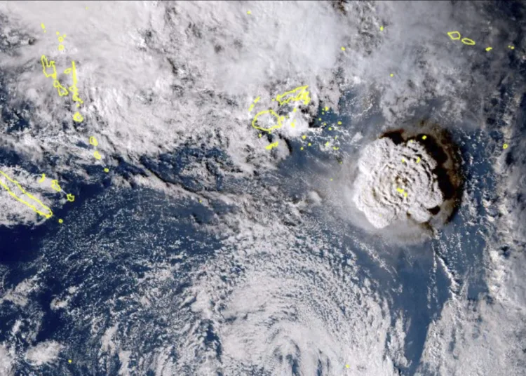 In this satellite image taken by Himawari-8, a Japanese weather satellite, and released by the agency, shows an undersea volcano eruption at the Pacific nation of Tonga Saturday, Jan. 15, 2022. An undersea volcano erupted in spectacular fashion near the Pacific nation of Tonga on Saturday, sending large waves crashing across the shore and people rushing to higher ground. (Japan Meteorology Agency via AP)