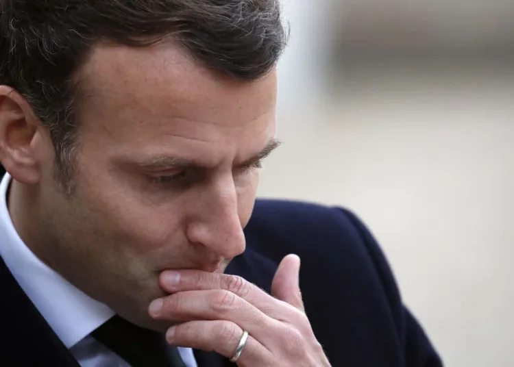 French President Emmanuel Macron, listens to Poland's Prime Minister Mateusz Morawiecki before a meeting at the Elysee Palace in Paris, Wednesday, March 17, 2021. (AP Photo/Christophe Ena)
