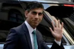Britain's Chancellor of the Exchequer Rishi Sunak arrives at 10 Downing Street, in London, Wednesday, Sept. 8, 2021. (AP Photo/Matt Dunham)