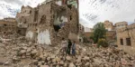 Siblings Mohammed, Batool and Luai Ali Zaid walk on the rubble of their neighbor’s house which was destroyed by conflict in the Old City of Sana’a. The children fled the area with their family after the incident but have since returned. They walk among the ruins, reminiscing the time they used to play with their now-deceased friends. With violence and loss a daily reality for Yemen’s civilians, mental health and psychological support needs continue to exacerbate in Yemen, particularly among those displaced and vulnerable, including children. ; The 2-years conflict in Yemen has displaced more than three million people, and 21 million are in need of some form of humanitarian assistance.