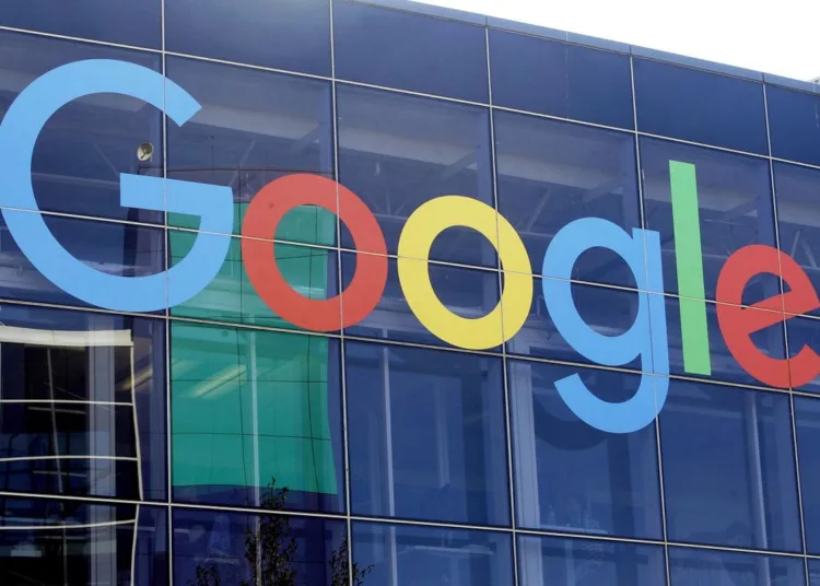 FILE - In this Sept. 24, 2019, file photo a sign is shown on a Google building at their campus in Mountain View, Calif. Google is once again postponing a return to the office for most workers until mid-January 2022. The internet search giant is also to requiring all employees to be vaccinated once its sprawling campuses are fully reopened. (AP Photo/Jeff Chiu, File)