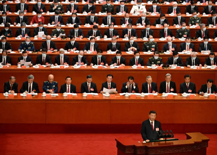 China's President Xi Jinping speaks during the opening session of the 20th Chinese Communist Party's Congress at the Great Hall of the People in Beijing on October 16, 2022. (Photo by Noel CELIS / AFP)