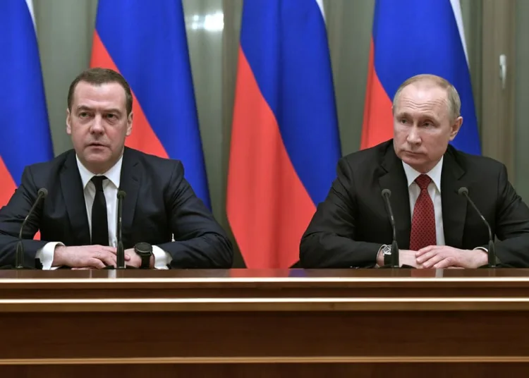 Russian President Vladimir Putin and Prime Minister Dmitry Medvedev attend a meeting with members of the government in Moscow, Russia January 15, 2020. Sputnik/Alexey Nikolsky/Kremlin via REUTERS  ATTENTION EDITORS - THIS IMAGE WAS PROVIDED BY A THIRD PARTY.