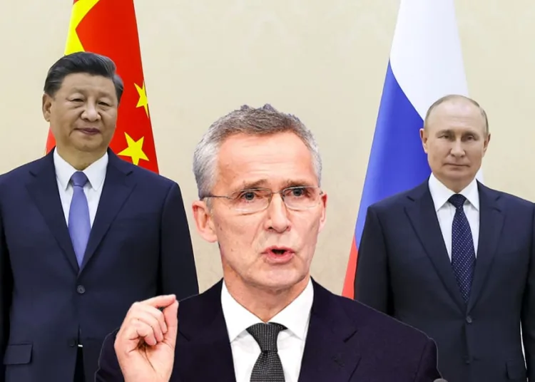 Chinese President Xi Jinping, left, and Russian President Vladimir Putin pose for a photo on the sidelines of the Shanghai Cooperation Organization (SCO) summit in Samarkand, Uzbekistan, Thursday, Sept. 15, 2022. (Alexandr Demyanchuk, Sputnik, Kremlin Pool Photo via AP)