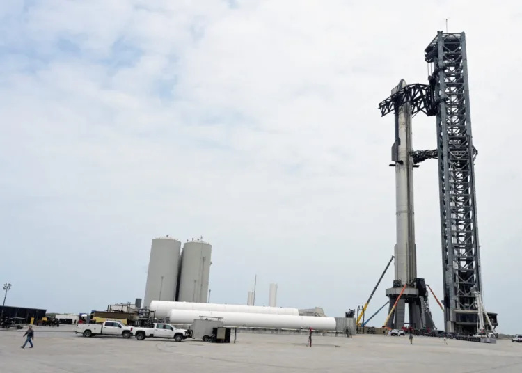 Crews prepare for the launch of the SpaceX Starship, near Brownsville, Texas, U.S., April 19, 2023. REUTERS/Steve Nesius
