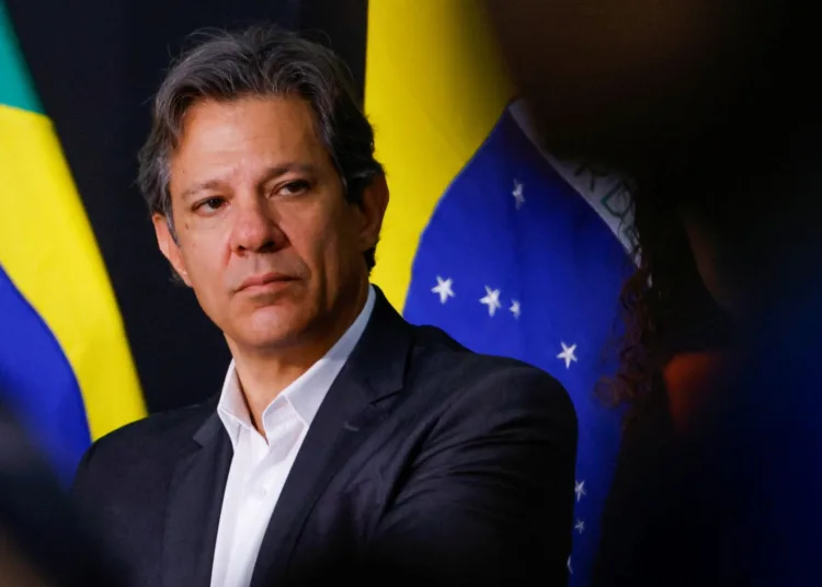 Brazil's new Economy Minister Fernando Haddad looks on during the inauguration ceremony of Brazil's new Planning and Budget Minister, Simone Tebet at the Planalto Palace in Brasilia, Brazil January 5, 2023. REUTERS/Adriano Machado