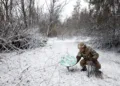 FILE PHOTO: “Psycho”, 22 from the 80th Separate Air Assault Brigade disconnects their Starlink on the front line at Orthodox Christmas, during a ceasefire announced by Russia over the Orthodox Christmas period, from the frontline region of Kreminna, Ukraine, January 6, 2023. REUTERS/Clodagh Kilcoyne/File Photo