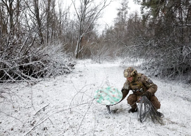 FILE PHOTO: “Psycho”, 22 from the 80th Separate Air Assault Brigade disconnects their Starlink on the front line at Orthodox Christmas, during a ceasefire announced by Russia over the Orthodox Christmas period, from the frontline region of Kreminna, Ukraine, January 6, 2023. REUTERS/Clodagh Kilcoyne/File Photo