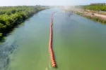 EAGLE PASS, TEXAS - JULY 18: Buoy barriers are installed and situated in the middle of the Rio Grande river on July 18, 2023 in Eagle Pass, Texas. Texas has begun installing buoy barriers along portions of the Rio Grande river in an effort to deter illegal border crossings. (Photo by Brandon Bell/Getty Images)