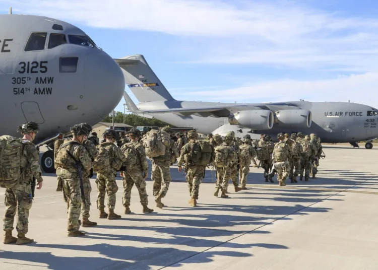 U.S. Army Paratroopers assigned to the 2nd Battalion, 504th Parachute Infantry Regiment, 1st Brigade Combat Team, 82nd Airborne Division, deploy from Pope Army Airfield, N.C., on Jan. 1, 2020.