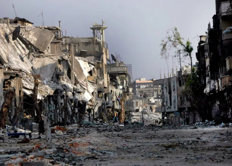 XNM03. HOMS (SIRIA), 30/07/2012.- Fotografía cedida por la Agencia Siria Árabe de Noticias de un edificio destruido en el área Al Karabise, en la provincia de Homs (Siria) hoy, lunes 30 de julio de 2012. Según la agencia, tropas sirias liberaron la zona de grupos armados terroristas, recuperando el control de la región entera. EFE/Agencia Siria Árabe de Noticias/SOLO USO EDITORIAL