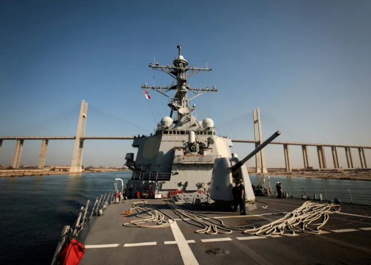 FILE PHOTO: The U.S. Navy Arleigh Burke-class guided-missile destroyer USS Carney transits the Suez Canal, Egypt October 18, 2023.  U.S. Navy/Mass Communication Specialist 2nd Class Aaron Lau/Handout via REUTERS.  THIS IMAGE HAS BEEN SUPPLIED BY A THIRD PARTY/File Photo