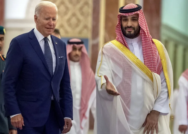 FILE - In this photo released by the Saudi Royal Palace, Saudi Crown Prince Mohammed bin Salman, right, welcomes U.S. President Joe Biden to Al-Salam Palace in Jeddah, Saudi Arabia, July 15, 2022. A federal judge dismissed a U.S. lawsuit against Saudi Crown Prince Mohammed bin Salman in the Saudi killing of U.S.-based journalist Jamal Khashoggi on Tuesday, Dec. 6, 2022, bowing to the Biden administration's insistence that the prince was legally immune in the case.(Bandar Aljaloud/Saudi Royal Palace via AP, File)
