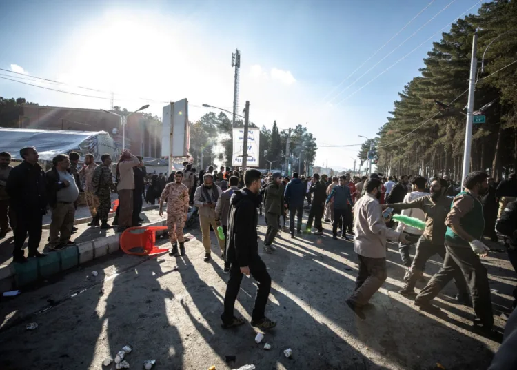 People gather at the scene of explosions during a ceremony held to mark the death of late Iranian General Qassem Soleimani, in Kerman, Iran, January 3, 2024. Majid Asgaripour/WANA (West Asia News Agency) via REUTERS
