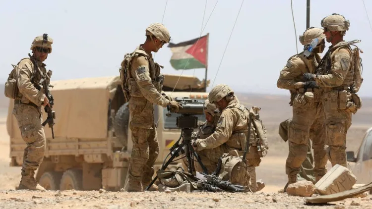 US soldiers participate in the annual military exercises known as "Eager Lion", near Maan some 200 kilometres south of the capital Amman on May 17, 2017.
Around 7,400 troops from more than 20 nations are taking part in the manoeuvres that include border security, cyber defence, and "command and control" exercises, to bolster coordination in response to threats including terrorism. / AFP PHOTO / KHALIL MAZRAAWI        (Photo credit should read KHALIL MAZRAAWI/AFP via Getty Images)
