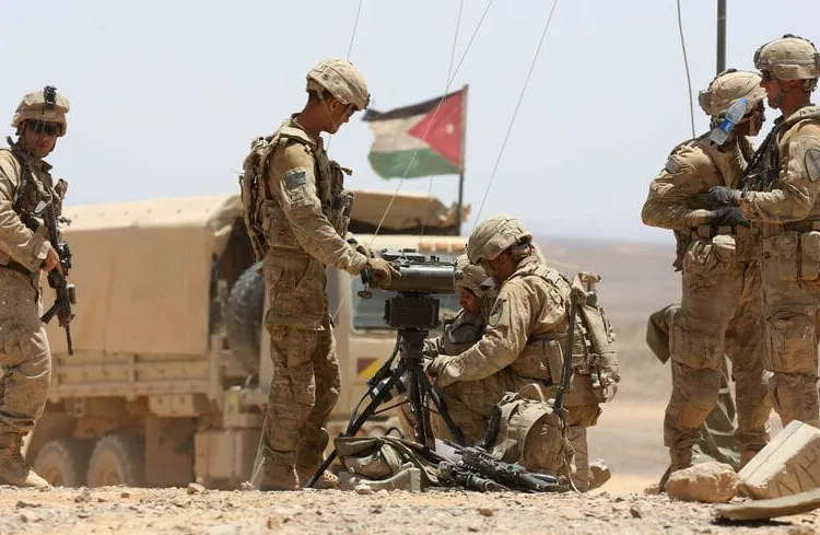 US soldiers participate in the annual military exercises known as "Eager Lion", near Maan some 200 kilometres south of the capital Amman on May 17, 2017.
Around 7,400 troops from more than 20 nations are taking part in the manoeuvres that include border security, cyber defence, and "command and control" exercises, to bolster coordination in response to threats including terrorism. / AFP PHOTO / KHALIL MAZRAAWI        (Photo credit should read KHALIL MAZRAAWI/AFP via Getty Images)