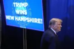 Republican presidential candidate former President Donald Trump walks backstage after speaking at a primary election night party in Nashua, N.H., Tuesday, Jan. 23, 2024. (AP Photo/Matt Rourke)