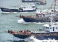 Hundreds of fishing boats leave for fishing as fishing ban in South China Sea ends in Yangjiang city, south Chinas Guangdong province, 16 August 2019. (Photo by Chen Jimin / Imaginechina / Imaginechina via AFP)
