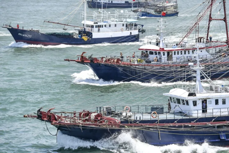 Hundreds of fishing boats leave for fishing as fishing ban in South China Sea ends in Yangjiang city, south Chinas Guangdong province, 16 August 2019. (Photo by Chen Jimin / Imaginechina / Imaginechina via AFP)