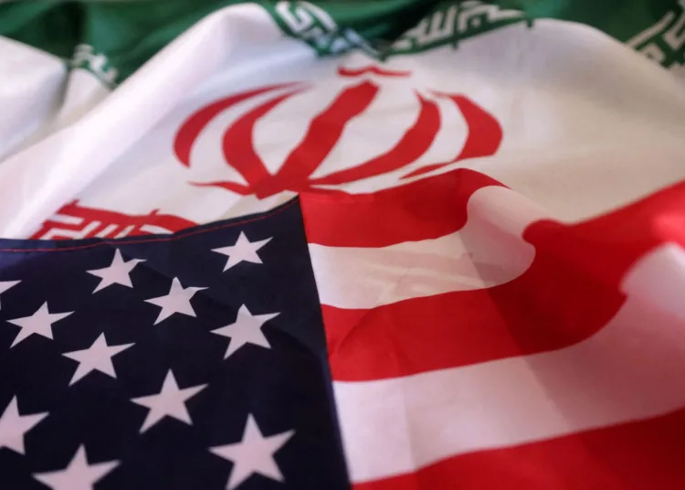 FILE PHOTO: USA and Iranian flags are seen in this illustration taken, September 8, 2022. REUTERS/Dado Ruvic/Illustration/File Photo