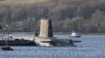 The submarine returns home to HMNB Clyde.