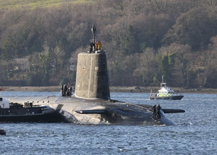 The submarine returns home to HMNB Clyde.