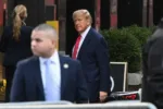 TOPSHOT - Former US President Donald Trump arrives at Trump Tower in New York on April 3, 2023. - Trump arrived on April 3, 2023 in New York where he will surrender to unprecedented criminal charges, taking America into uncharted and potentially volatile territory as he seeks to regain the presidency. The 76-year-old Republican, the first US president ever to be criminally indicted, will be formally charged Tuesday over hush money paid to a porn star during the 2016 election campaign. (Photo by Ed JONES / AFP)