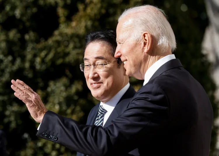 U.S. President Joe Biden waves as he welcomes Japan's Prime Minister Fumio Kishida at the White House in Washington, U.S., January 13, 2023. REUTERS/Jonathan Ernst