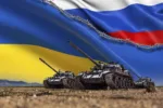 A Group of tanks lined up in front of Russian and Ukrainian flags. Several military army war battle tank vehicles on the terrain are ready to attack. Russian-Ukrainian conflict or war