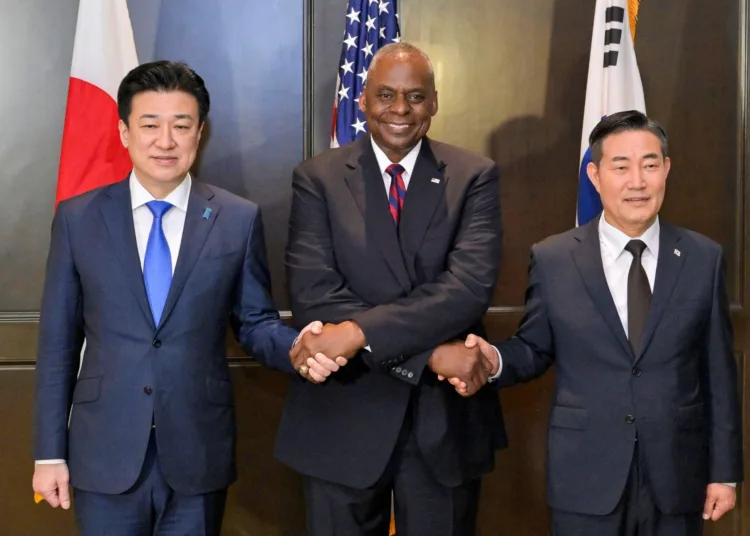 Japanese Defense Minister Minoru Kihara, U.S. Defense Secretary Lloyd Austin and South Korean Defence Minister Shin Won-sik attend a trilateral meeting on sidelines of the Shangri-la Dialogue in Singapore, June 2, 2024. REUTERS/Caroline Chia
