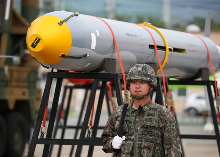 A South Korean soldier stands in front of a missile displayed during a media day for the 71st anniversary of Armed Forces Day at Daegu Air Base in Daegu, South Korea, on Friday, Sept. 27, 2019. South Korea announced last month it would withdraw from a military information-sharing agreement with Japan in November, prompting U.S. Assistant Secretary of Defense Randall Schriver to warn Seoul that its decision threatened U.S. security interests. Photographer: SeongJoon Cho/Bloomberg