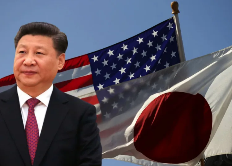 FILE PHOTO: The U.S. and Japan flags fly together outside the White House in Washington April 27, 2015. REUTERS/Kevin Lamarque/File Photo