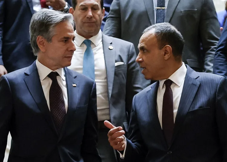 US Secretary of State Antony Blinken (L) walks down a staircase with Egypt's Foreign Minister Badr Abdelatty (R) during their meeting at Tahrir palace in the centre of Cairo on September 18, 2024. - Blinken arrived on September 18 on his 10th trip to the Middle East since the start of the war in Gaza nearly a year ago to try to revive stalled ceasefire talks. After months of mediated negotiations failed to pin down a ceasefire, Washington said it was still working with mediators Qatar and Egypt to finalise an agreement. (Photo by EVELYN HOCKSTEIN / POOL / AFP)
