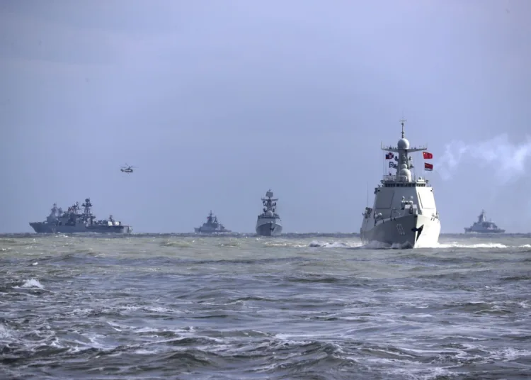 FILE - In this photo released by Xinhua News Agency, Chinese and Russian warships take part in a joint naval drills in the East China Sea, Dec. 27, 2022. (Xu Wei/Xinhua via AP, File)