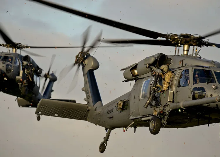 Two HH-60G Pave Hawk helicopters respond in a combat scenario for search and rescue on the Royal Air Force Lakenheath facility in the United Kingdom, Jan. 16, 2015. The helicopters are assigned to the 56th Rescue Squadron.
U.S. Air Force photo by Airman 1st Class Trevor T. McBride