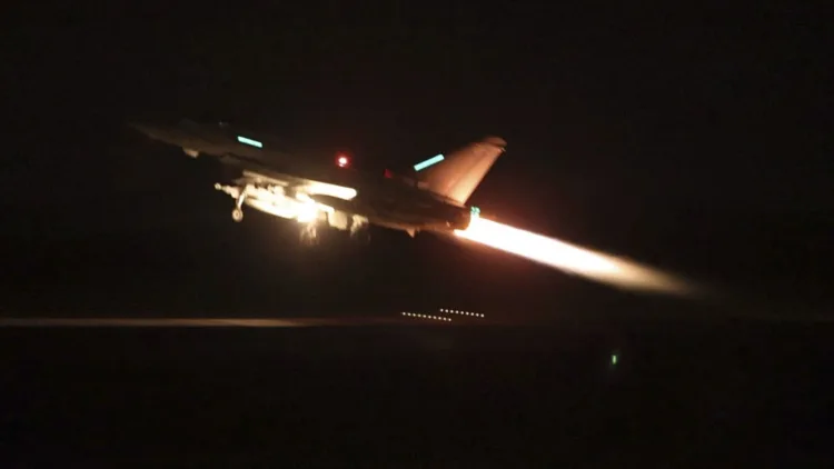 In this image provided by the UK Ministry of Defence taken on Thursday Jan. 11, 2024  shows an RAF Typhoon aircraft taking off from RAF Akrotiri in Cyprus, for a mission to strike targets in Yemen. The U.S. and British militaries bombed more than a dozen sites used by the Iranian-backed Houthis in Yemen late on Thursday, in a massive retaliatory strike using warship- and submarine-launched Tomahawk missiles and fighter jets, U.S. officials said. (Sgt Lee Goddard, UK Ministry of Defence via AP)