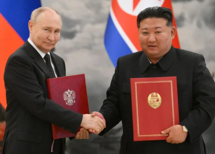 Russia's President Vladimir Putin shakes hands with North Korea's leader Kim Jong Un at a signing ceremony following bilateral talks in Pyongyang, North Korea June 19, 2024. Sputnik/Kristina Kormilitsyna/Kremlin via REUTERS ATTENTION EDITORS - THIS IMAGE WAS PROVIDED BY A THIRD PARTY.